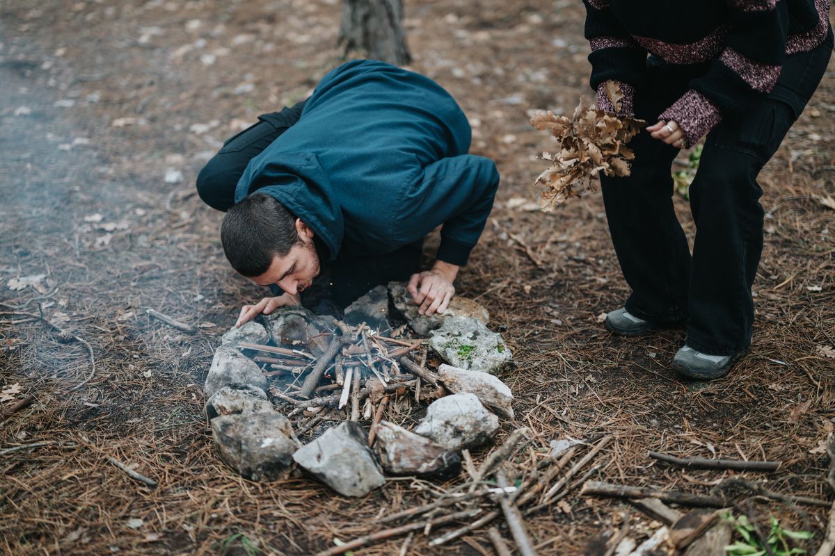 Group,In,A,Forest,Setting,Starting,A,Campfire,,Embodying,Outdoor